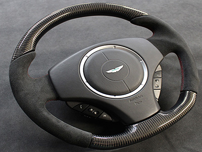re trim steering wheel by Designls ltd Aston Martin black Alcantara carbon