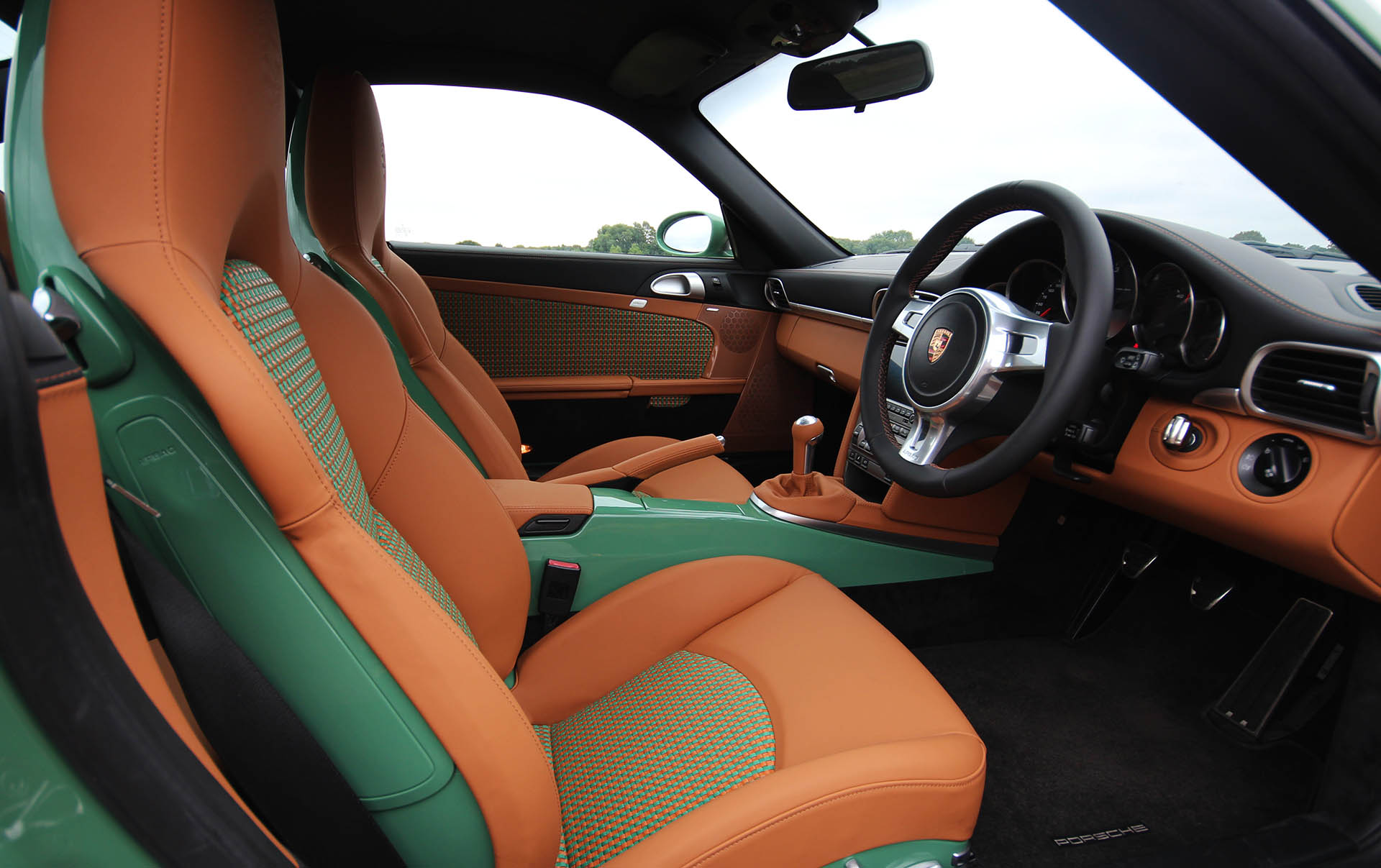 Porsche 911 997 Sports Classic conversion full basket weave leather interior re-trim upholstery by Designls ltd featuring Cognac-tan, green, black colours front cabin