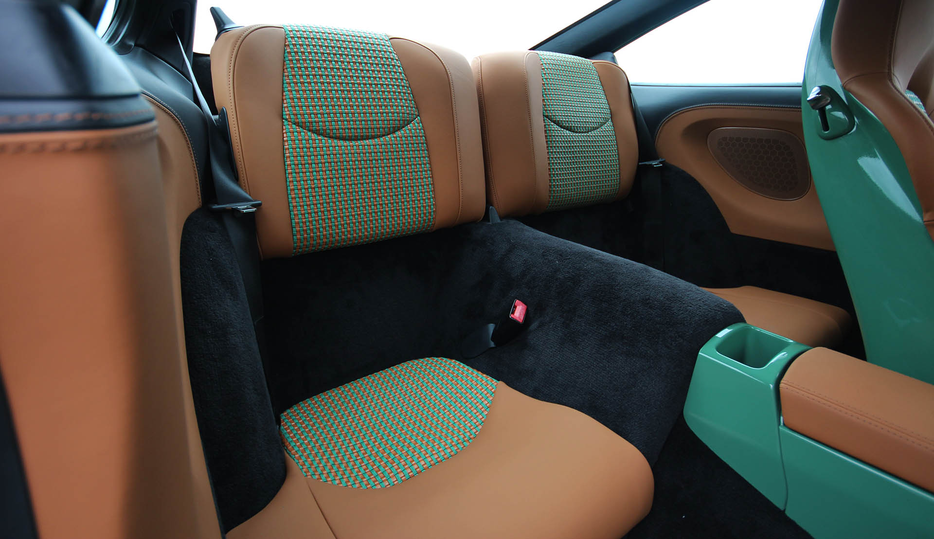 Porsche 911 997 Sports Classic custom leather interior upholstery re-trim by Designls ltd featuring rear seats with basket weave inserts