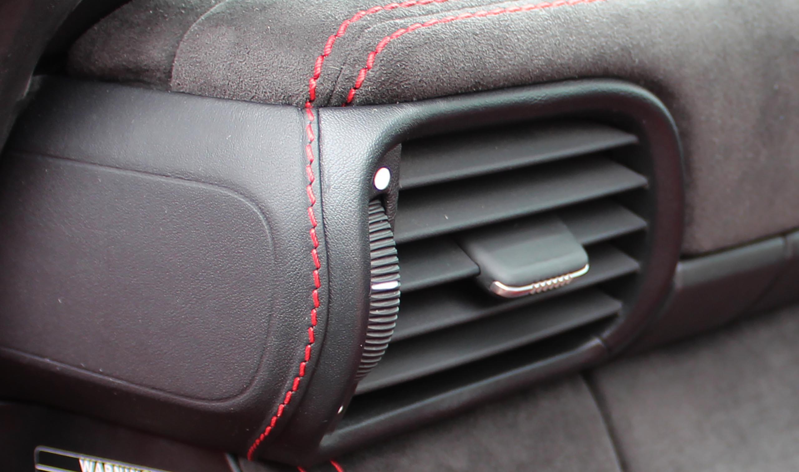 Porsche 911 997 gt3 extended leather dashboard side air vent in black leather with red stitching by Designls 